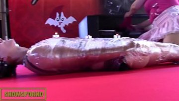 Redhead domina on stage