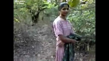 Indian dame nailing in forest