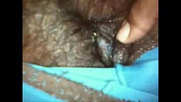 Indian teenie demonstrating big furry vagina