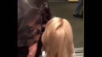 Blonde cougar blowing black stud in Elevator in public with others witnessing